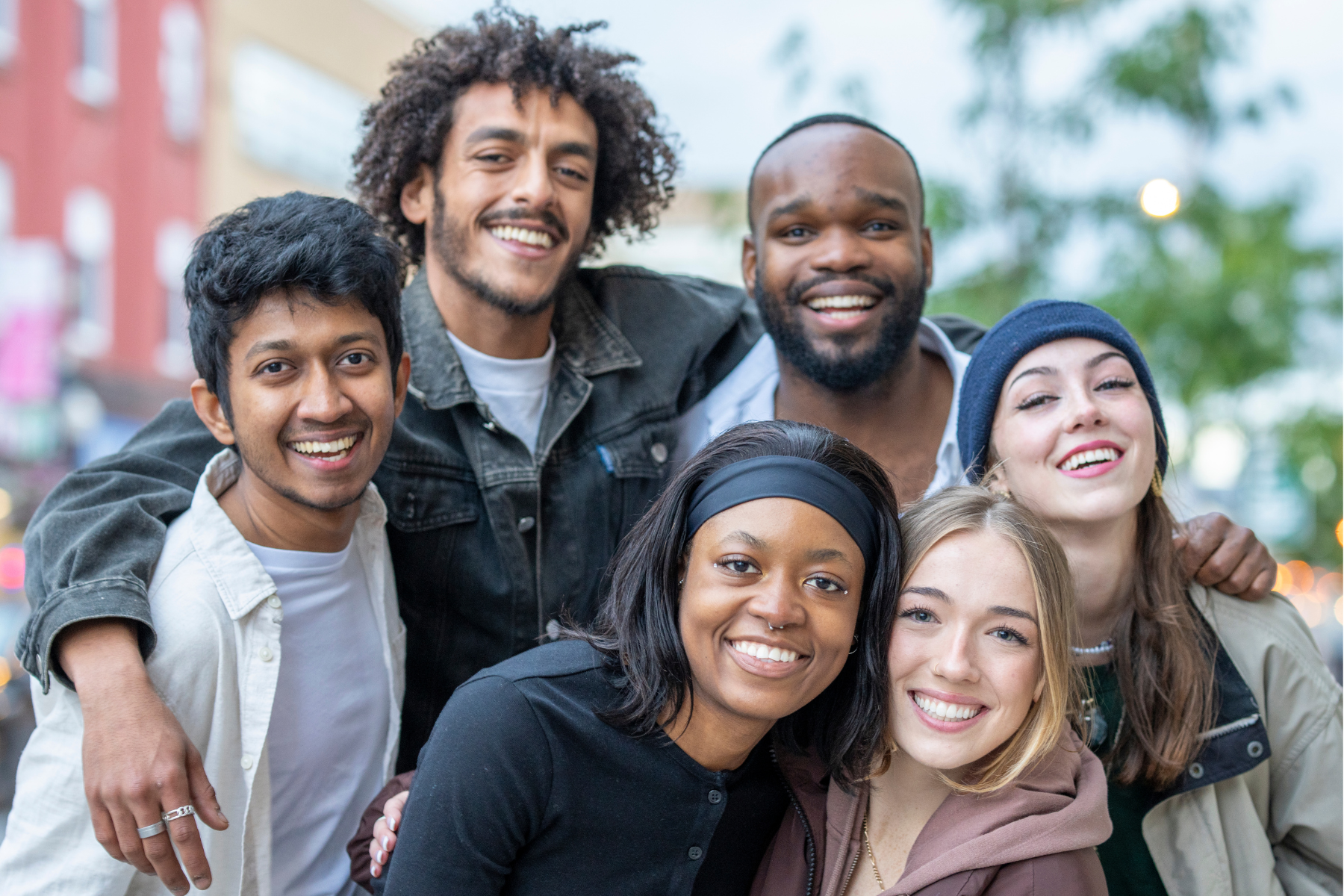 A group of young adults outside.